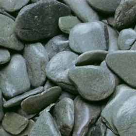 A collection of green paddle stones with various shades of green and smooth, flat shapes.