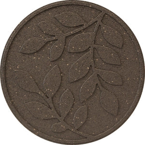 The image shows a round stone with an embossed leaf design